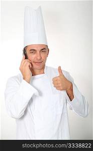 Closeup of chef talking on the phone