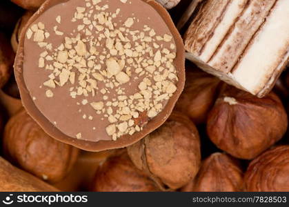 Closeup of coffee beans, cinnamon and nuts