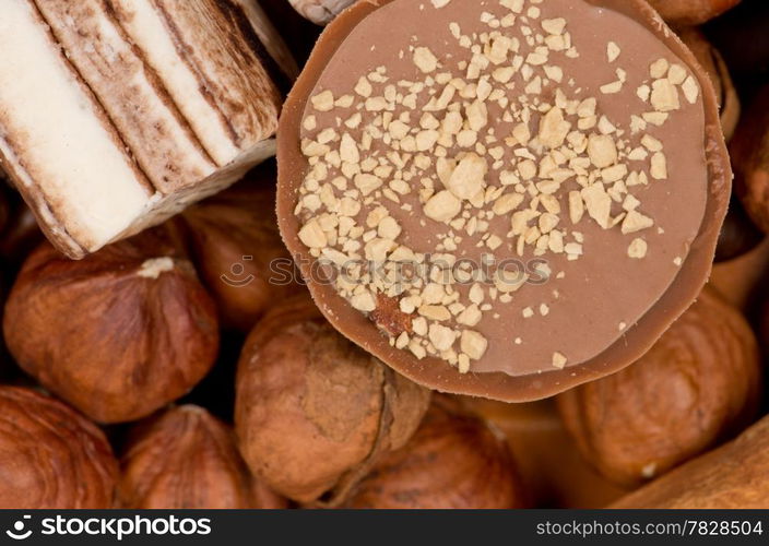 Closeup of coffee beans, cinnamon and nuts