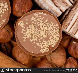 Closeup of coffee beans, cinnamon and nuts