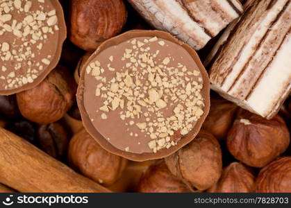 Closeup of coffee beans, cinnamon and nuts