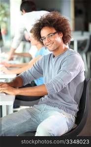 Closeup of college student in computer lab