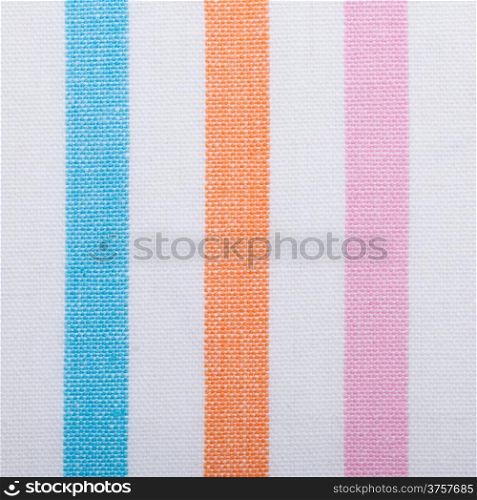 Closeup of colorful striped fabric textile as background texture or pattern. square format. Macro.