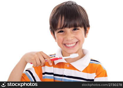Closeup of cute kid brushing his teeth on isolated white background
