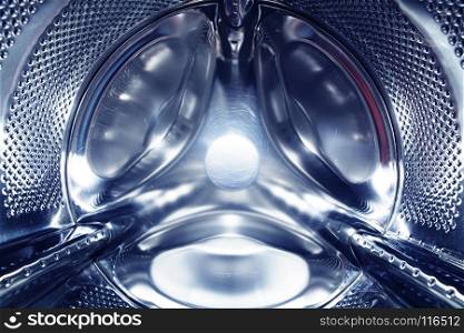 closeup of drum in washing machine, new technology