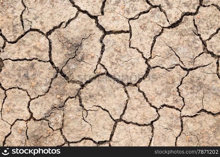 closeup of dry soil and gravel , season and global warming concept