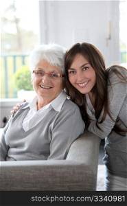 Closeup of elderly woman with young woman