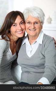 Closeup of elderly woman with young woman