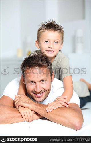 Closeup of father and son at home