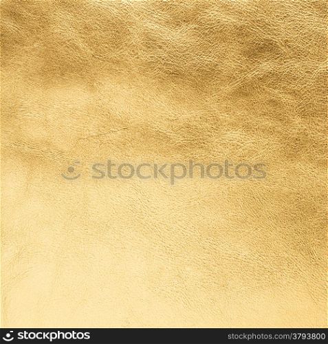 Closeup of golden color leather texture background.