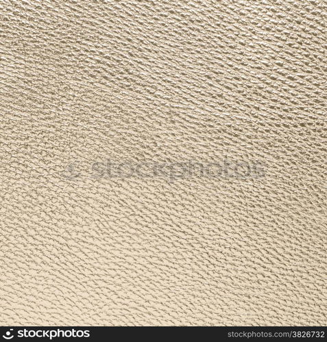 Closeup of golden color leather texture background.