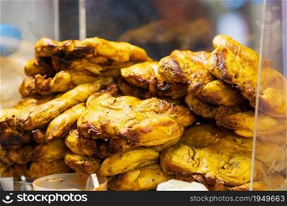 Closeup of Grilled chicken with turmeric, thai street food market