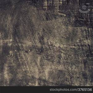 Closeup of grunge black metal plate as background or texture. Square format.