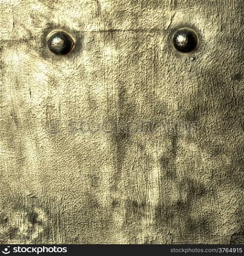 Closeup of grunge gray grey metal plate with rivets and screws as background or texture. Square format.