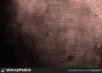 Closeup of grunge red claret metal plate as background or texture