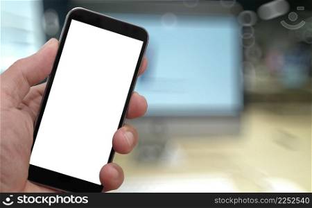 Closeup of Hand holding Blank Screen of Smart phone with blurred background as concept