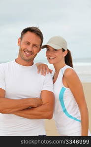 Closeup of happy couple in running outfit