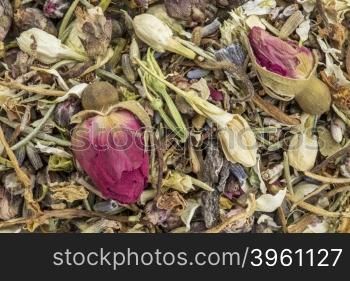 Closeup of healthy skin herbal tea, a blend of red rose bud. peach flower, lavender, rosemary, honeysuckle