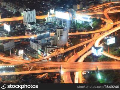Closeup of highest Aerial view of Bangkok Highway at Dusk in Thailand
