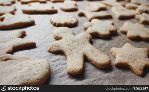closeup of homemade cookies in different shapes with intentional blur
