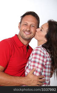 Closeup of in loved couple kissing on white background