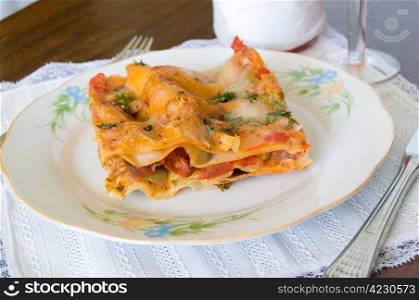 Closeup of lasagna slice on a plate