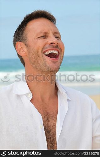 Closeup of man laughing outloud