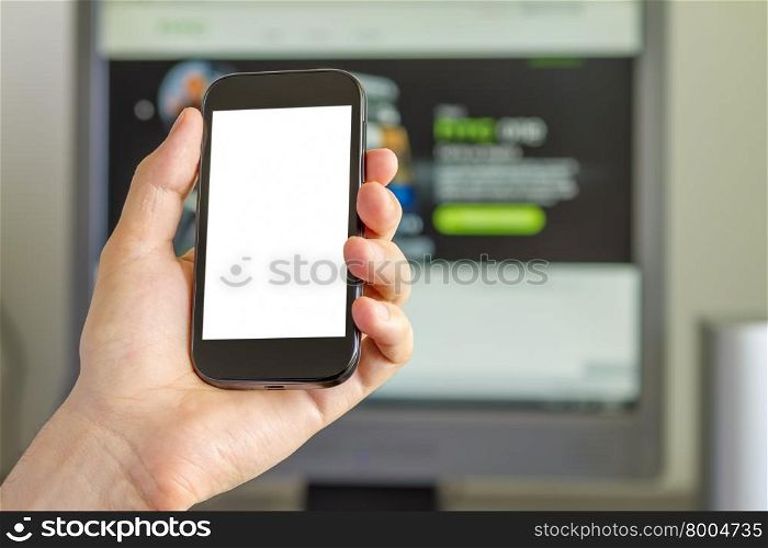 Closeup of Man&rsquo;s Hand holding a Smartphone in Office