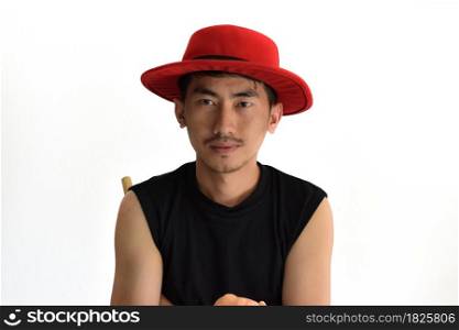 Closeup of man wearing red hats isolated on white.
