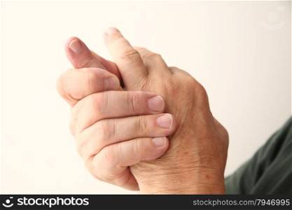 closeup of man with an aching little finger