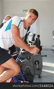 Closeup of man working out in gym
