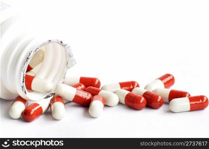 Closeup of medicine capsules on a white background