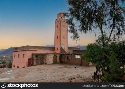 closeup of mosque tower in a town lost in the atlas mountains and in the vicinity of morocco. Morocco