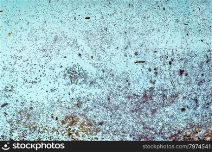 closeup of old, grunge metal car body texture with blue paints and rusty spots