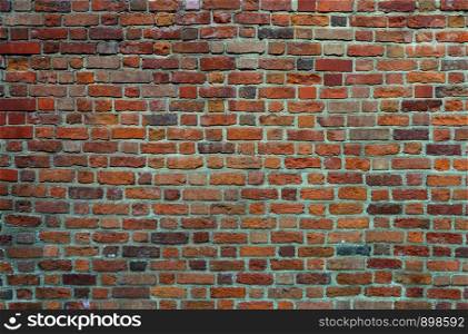 Closeup of old red brick wall surface