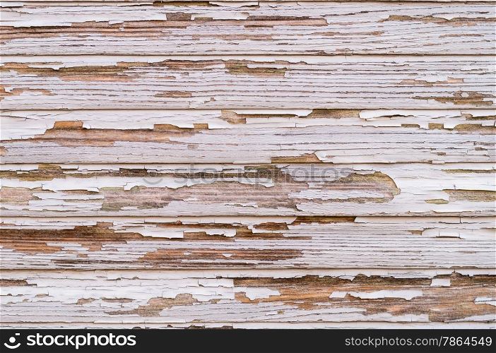 Closeup of old wood with paint that peels off