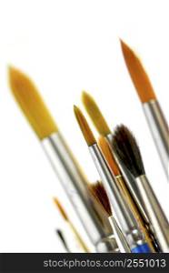 Closeup of paintbrushes on white background