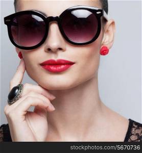 Closeup of perfect model in big rounded sunglasses. text space and copy space