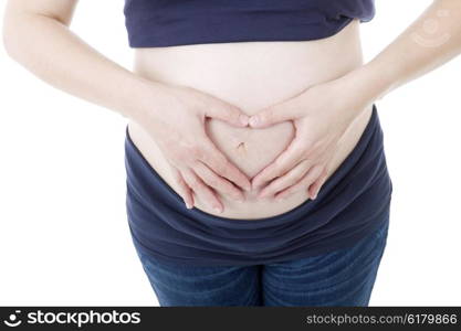 Closeup of pregnant woman at white background