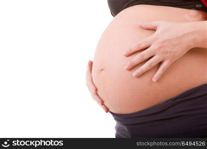 Closeup of pregnant woman at white background. pregnant woman