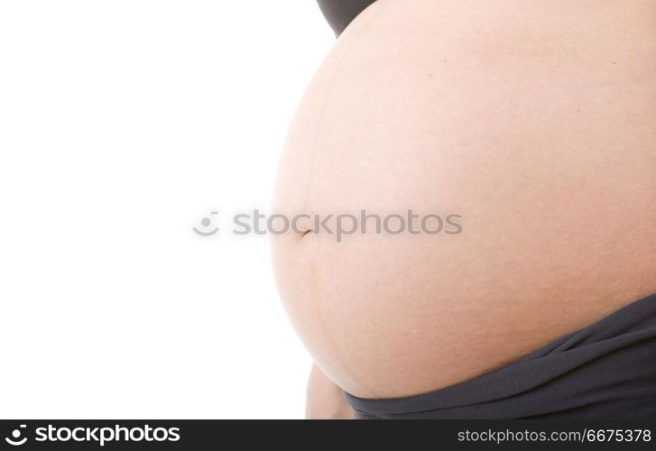 Closeup of pregnant woman at white background. pregnant woman