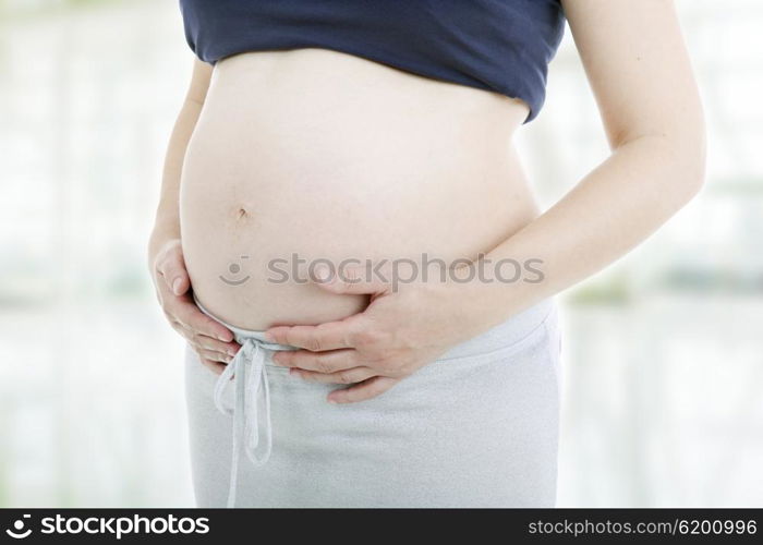 Closeup of pregnant young woman