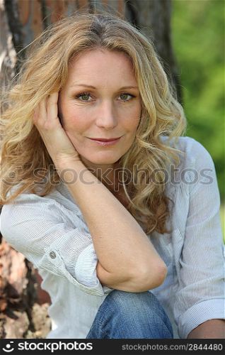 Closeup of relaxed woman in park