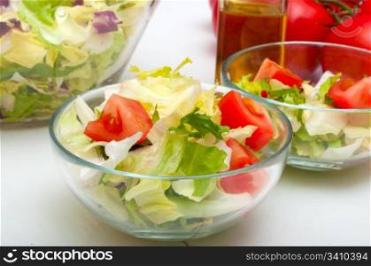 Closeup of Salad of Fresh Green Vegetables in Glass Bowl