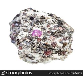 closeup of sample of natural mineral from geological collection - ruby and corundum crystals in unpolished gneiss rock isolated on white background. ruby and corundum crystals in rough gneiss rock