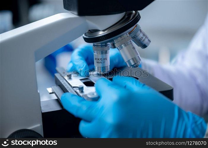 Closeup of Scientific microscope data analysis in the laboratory