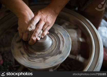 Closeup of sculptor man hand with him job