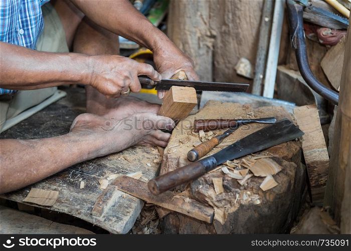 closeup of sculptor man with him job