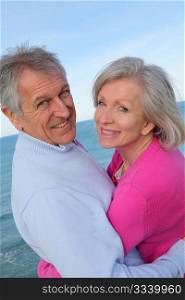 Closeup of senior couple by the sea