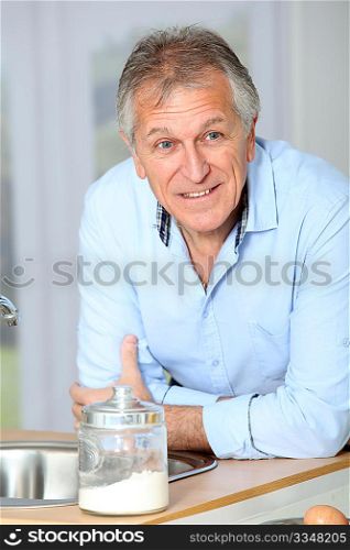 Closeup of senior man in home kitchen